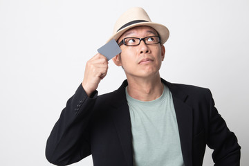 adult asian man think with a blank card.
