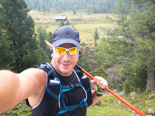 selfie by a man who has been trailrunning in the carinthian mountains in august
