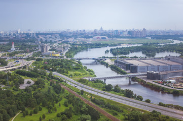 Obraz premium Beautiful summer panoramic landscape. Bird's-eye view of Myakininsky metro bridge and Spassky bridge