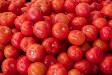 fresh red tomatoes at the market