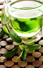 cup of fresh tea, fresh tea leaves