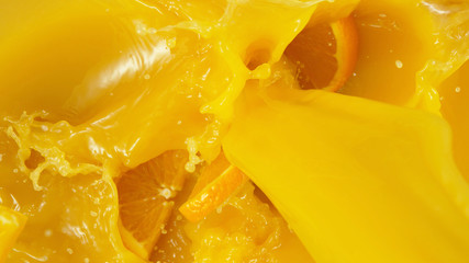 Detail of pouring orange juice