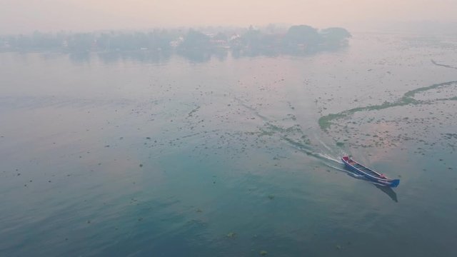 Fishing baot at sunrise, Fort Kochi, India. Aerial drone view