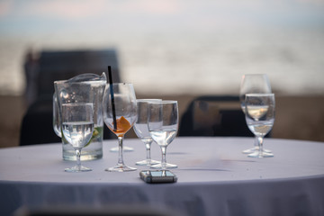 empty glasses after a beach party at the baltic sea