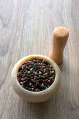 onyx pounder and pepper mix on wooden table