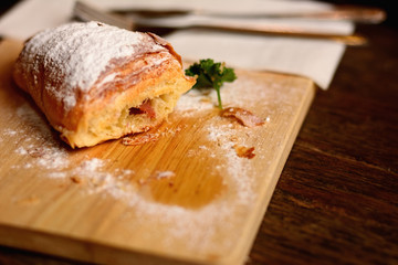 Croissant ham cheese sprinkled with flour, add with mint.