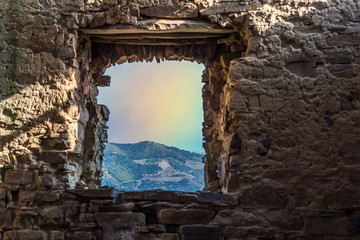 Rainbow in a Window in an Ancient Windmill in the Hills of Southern Italy