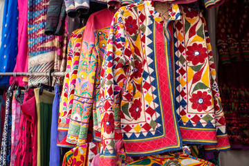 Traditional Indian clothes and accessories market at Udaipur city, Rajasthan, India