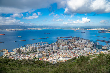 Fototapeta na wymiar A view of the city of Gibraltar from a fortress in a nature reserve on a hill
