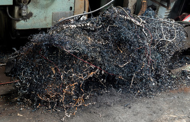 Fototapeta premium steel shavings.Steel scrap materials recycling. 