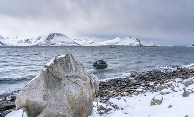 Fishfarm in Winter landscape on Vengs&oslash;y Island in northern Norway near Tromsoe