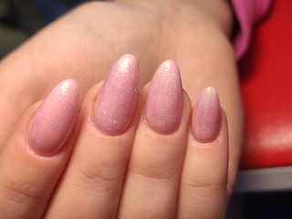 stylish manicure with a design on beautiful hands