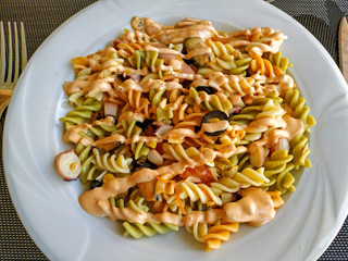 Pasta with seafood and sauce.