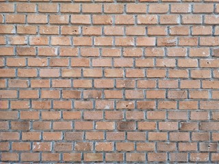 Red brick block wall show Pattern stack block rough surface texture material background Weld the joints with cement grout