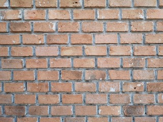 Red brick block wall show Pattern stack block rough surface texture material background Weld the joints with cement grout