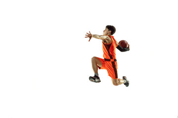 Fototapeta na wymiar Young basketball player of team wearing sportwear training, practicing in action, motion in jump, flight isolated on white background. Concept of sport, movement, energy and dynamic, healthy lifestyle