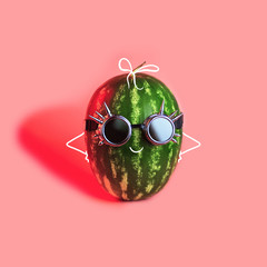 a watermelon punk in rocker glasses on pink background
