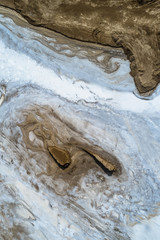 aerial view of a dry lakebed coated with salts in northwest of China