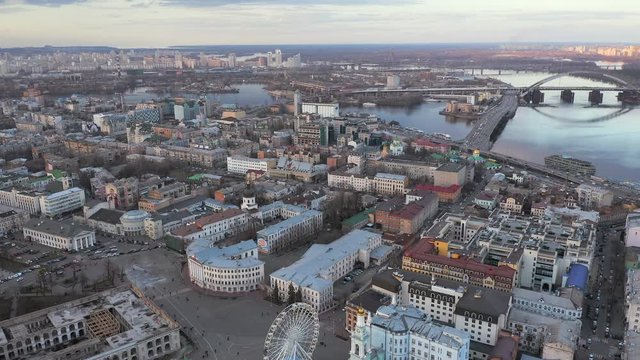 Aerial view of Old Historic Podil District, Dnipro River at sunset, Kyiv, Ukraine
