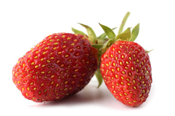 Two strawberries isolated on white