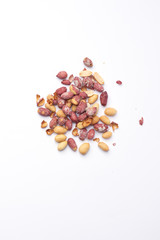 Roasted peanuts on white background. Copy space