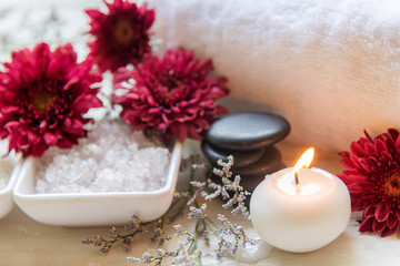 Obraz na płótnie Canvas Spa beauty massage health wellness background. Spa Thai therapy treatment aromatherapy for body woman with flower nature candle for relax and summer time, top view. Lifestyle and cosmetic Concept