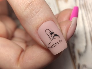 fashion manicure of nails on a beautiful textural