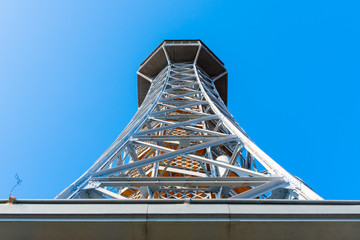 Petrin Tower. Detailed view on sunny day with blue sky background. Prague, Czech Republic