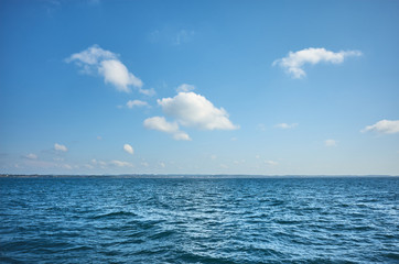 Fototapeta na wymiar Sky over the ocean on a sunny day.