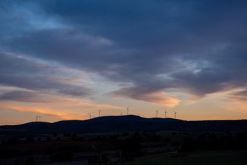 sunset at the wind farm