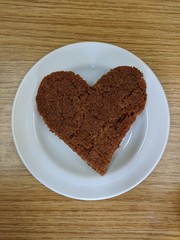Heart shaped cookie on plate