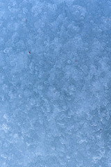 ice on the river. air bubbles in frozen water . photo for background