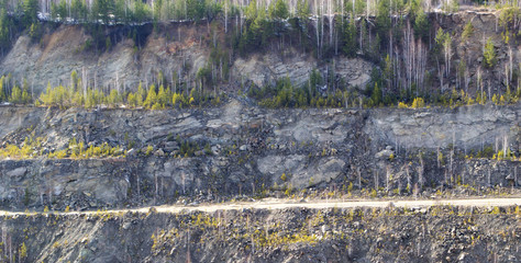 Graphite quarry. Open pit mining of graphite