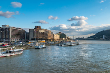 Obraz premium aerial view of Budapest on Danube river under dramatic sky