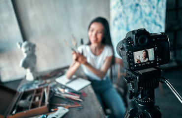 Naklejka na ściany i meble Asian female artist blogger