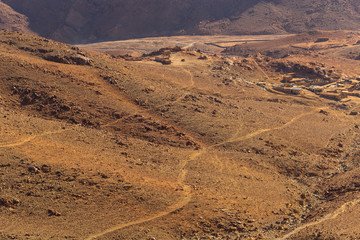 Fototapeta premium Egypt. Bedouin village. Mount Sinai in the morning in the bright sun. (Mount Horeb, Gabal Musa, Moses Mount). Pilgrimage place and famous touristic destination.