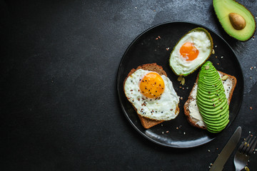 Fototapeta na wymiar avocado sandwich (healthy snack) menu concept. food background. top view. copy space