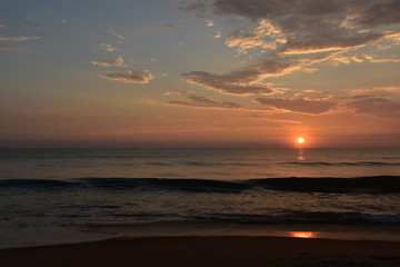 Fototapeta na wymiar sunset in a horizon , in a beach in goa