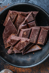 chocolate (delicious cocoa dessert, pieces sweets) menu concept. food background. top view. copy space 