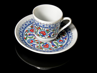 cup of Turkish coffee on black background