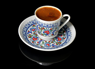 cup of Turkish coffee on black background