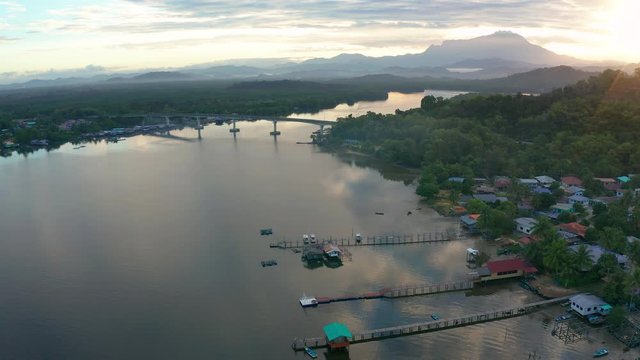 Aerial 4K footage of beautiful sunrise landscape scenery at Mengkabong River Tuaran, Sabah, Malaysia 