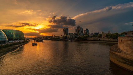 Naklejka premium Panoramic view of the Shard and the Financial District from the Tower Bridge at sunset, London, England, GB