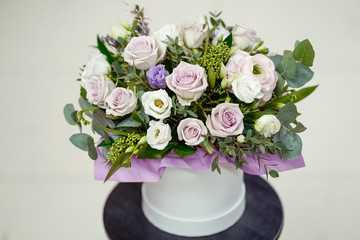 A bouquet of delicate fresh flowers in lilac tones