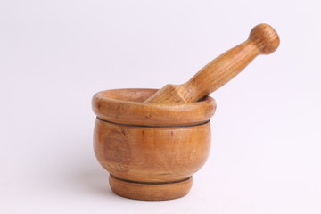cooking wooden mortar in color background