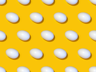 Eggs seamless pattern isolated on a yellow background