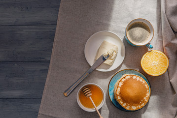 Obraz na płótnie Canvas Spring breakfast with coffee and pancakes