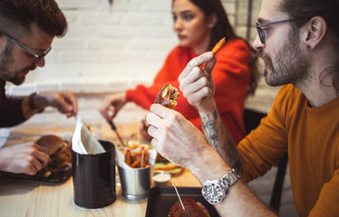 Young People Ordering Food in Fast Food Restaurant	