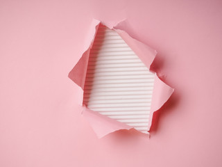 background with torn paper and place for your message, trending holes in paper