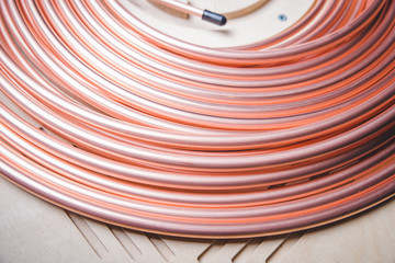 Copper tubes for cooling systems, air conditioners are wound on large coils. Copper tube production
